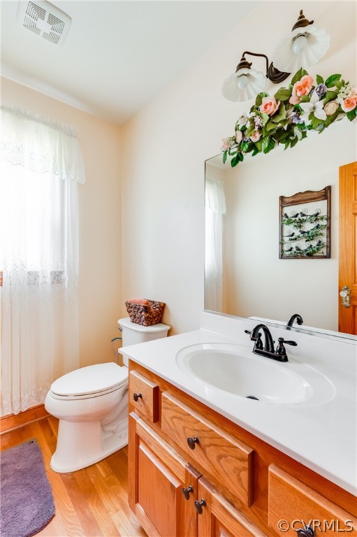 19070 Halifax Road Carson, VA 23830 - Photo 27 of 43 a bathroom with a sink a toilet and a mirror