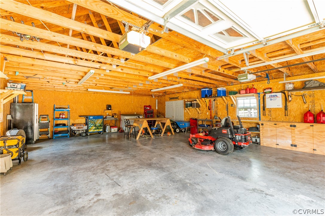 19070 Halifax Road Carson, VA 23830 - Photo 37 of 43 a view of a garage with a car and a garage