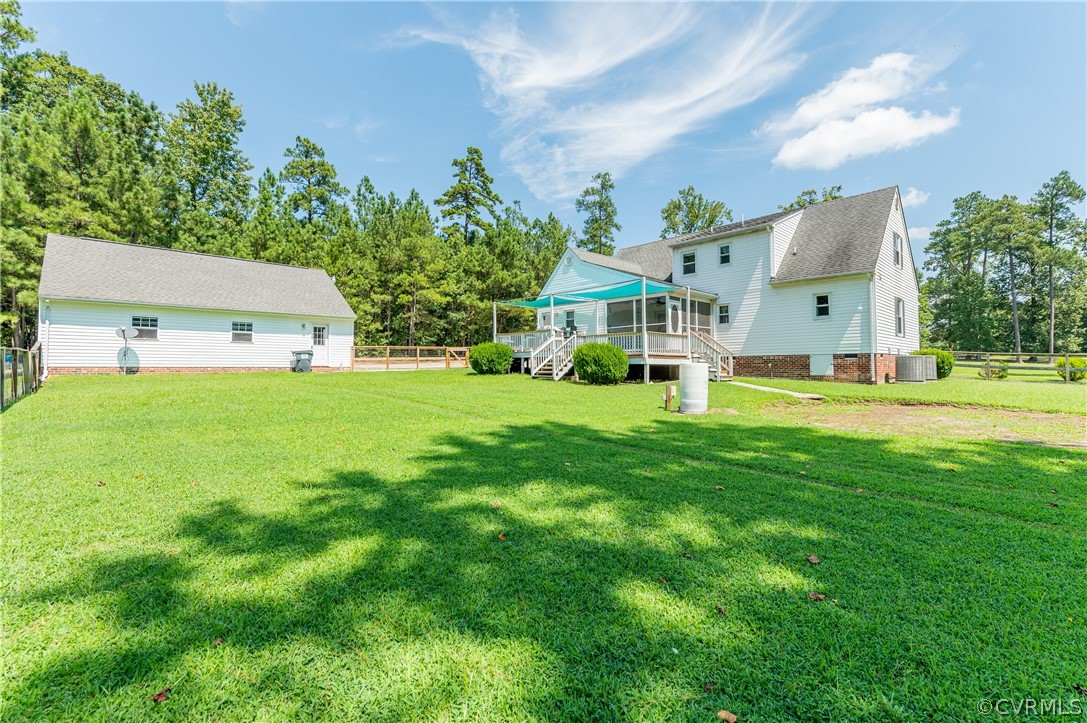 19070 Halifax Road Carson, VA 23830 - Photo 40 of 43 a view of a house with a big yard and large trees