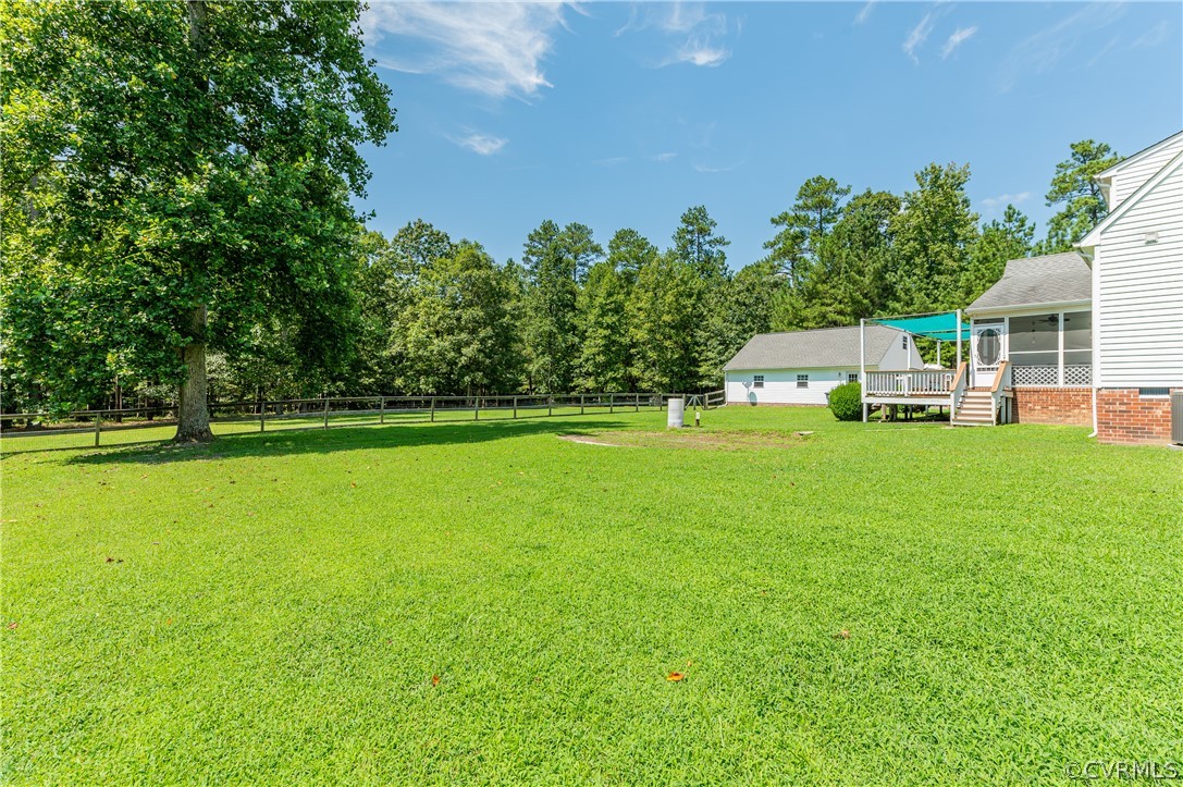 19070 Halifax Road Carson, VA 23830 - Photo 41 of 43 a house view with swimming pool and garden space