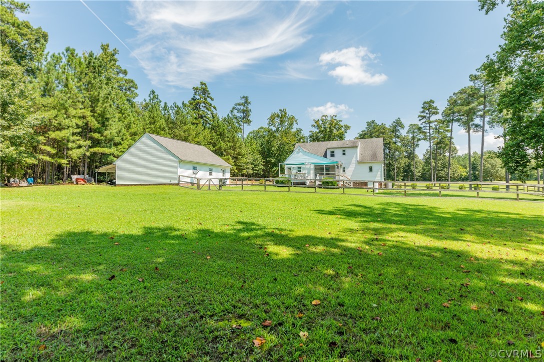 19070 Halifax Road Carson, VA 23830 - Photo 42 of 43 a view of a house with a big yard and large trees