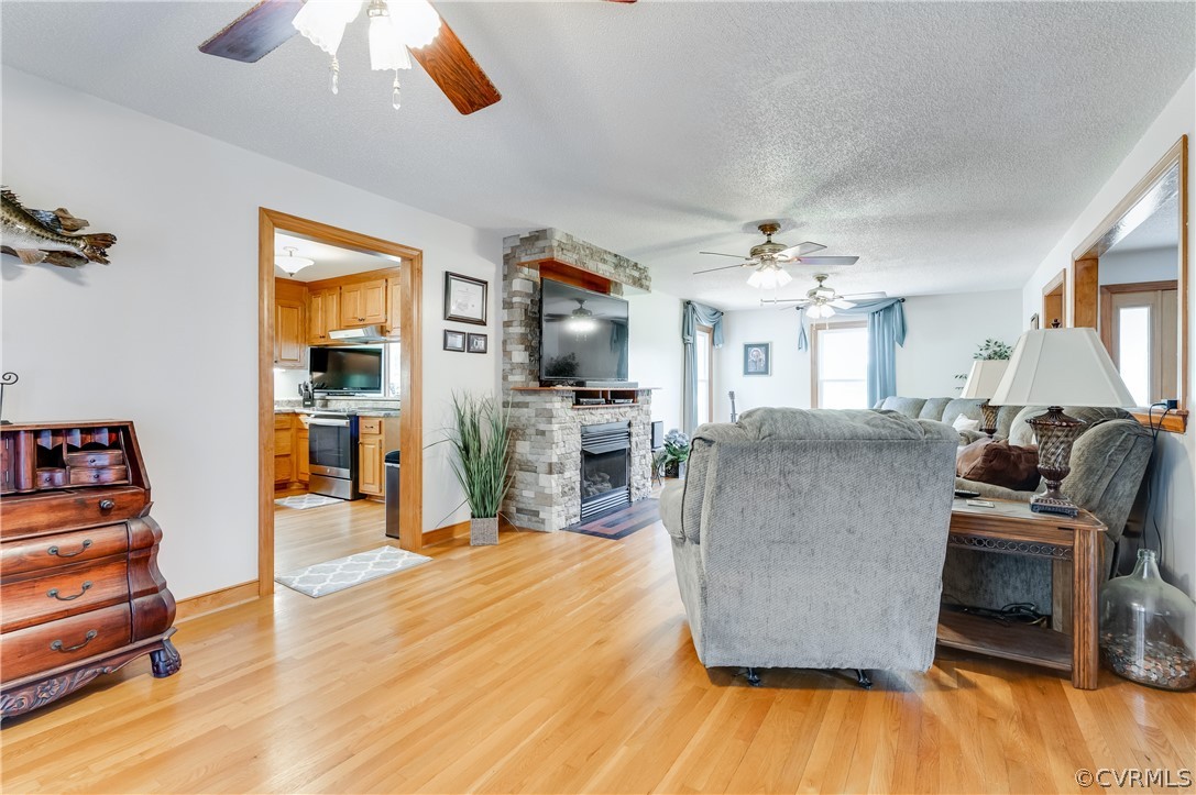 19070 Halifax Road Carson, VA 23830 - Photo 8 of 43 a living room with furniture and a wooden floor