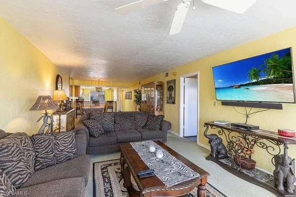 a view of balcony with furniture