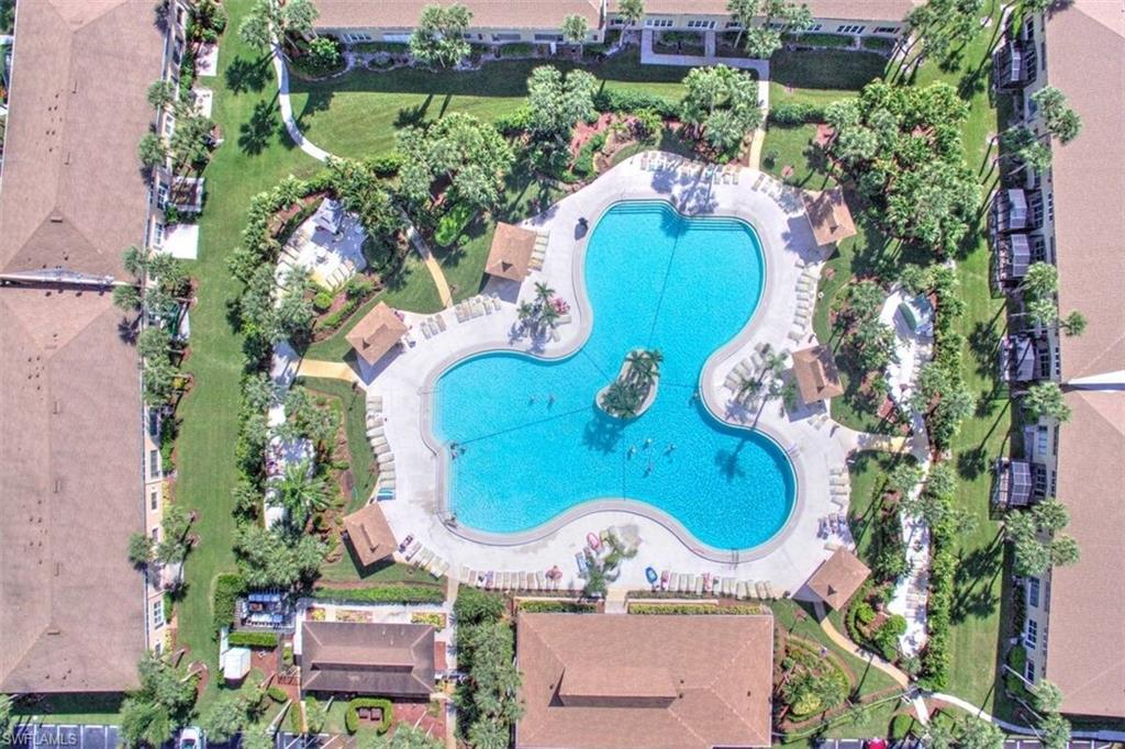 3832 Snowflake Lane, Unit 1207 Naples, FL 34112 - Photo 20 of 22 an aerial view of a swimming pool and outdoor space