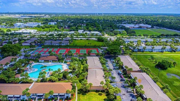 a kitchen with appliances cabinets and a sink