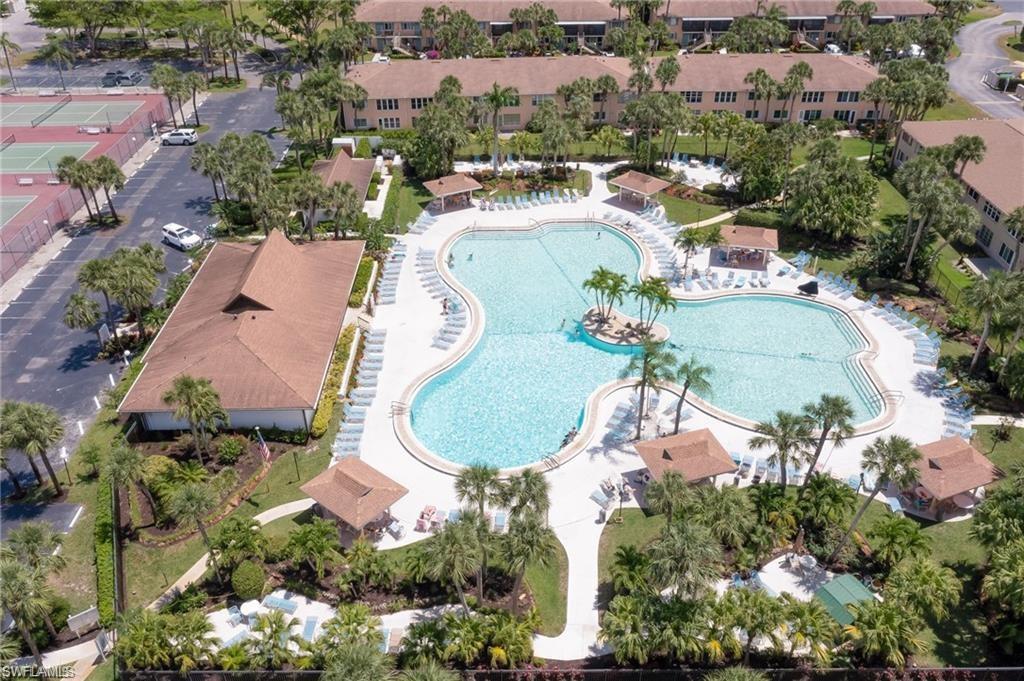 3832 Snowflake Lane, Unit 1207 Naples, FL 34112 - Photo 22 of 22 an aerial view of a swimming pool