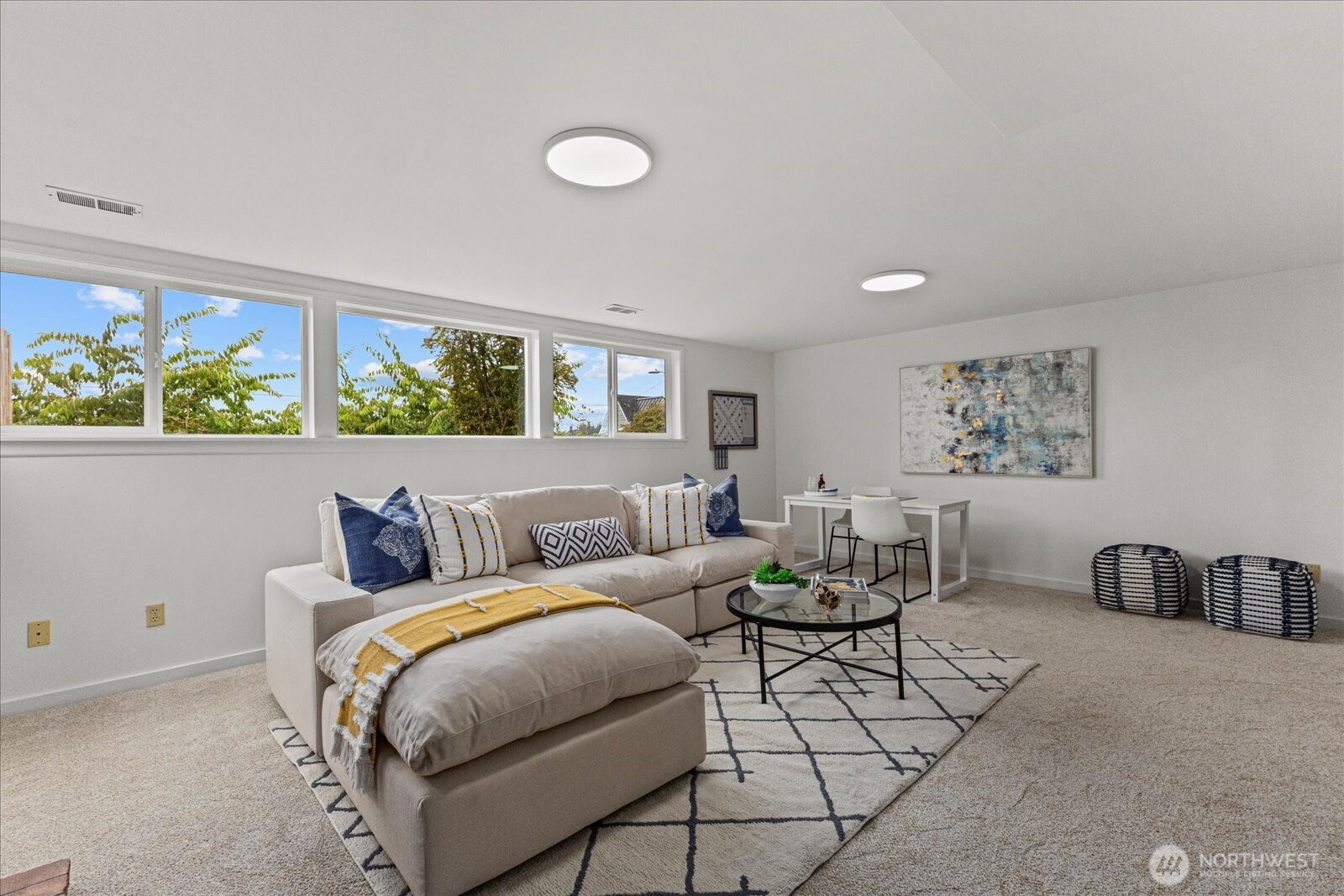 2819 West McGraw Street Seattle, WA 98199 - Photo 27 of 40 a living room with furniture and a window