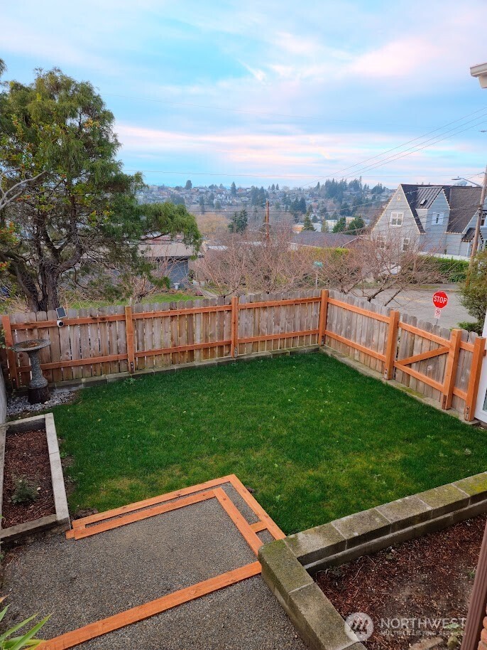 2819 West McGraw Street Seattle, WA 98199 - Photo 33 of 40 a view of a backyard with a garden