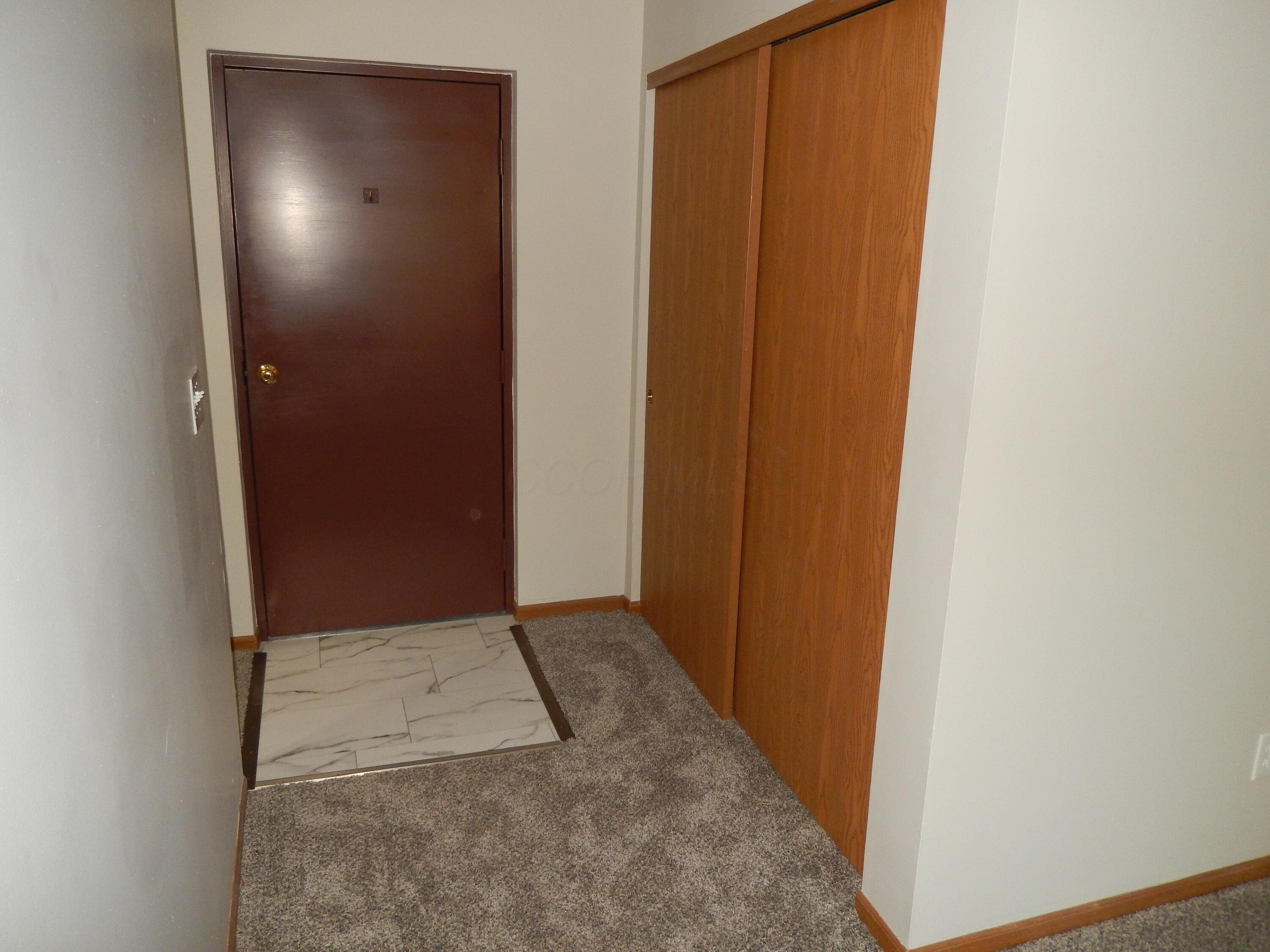 4117 Karl Road, Unit 302 Columbus, OH 43224 - Photo 4 of 33 Front entry with double closet