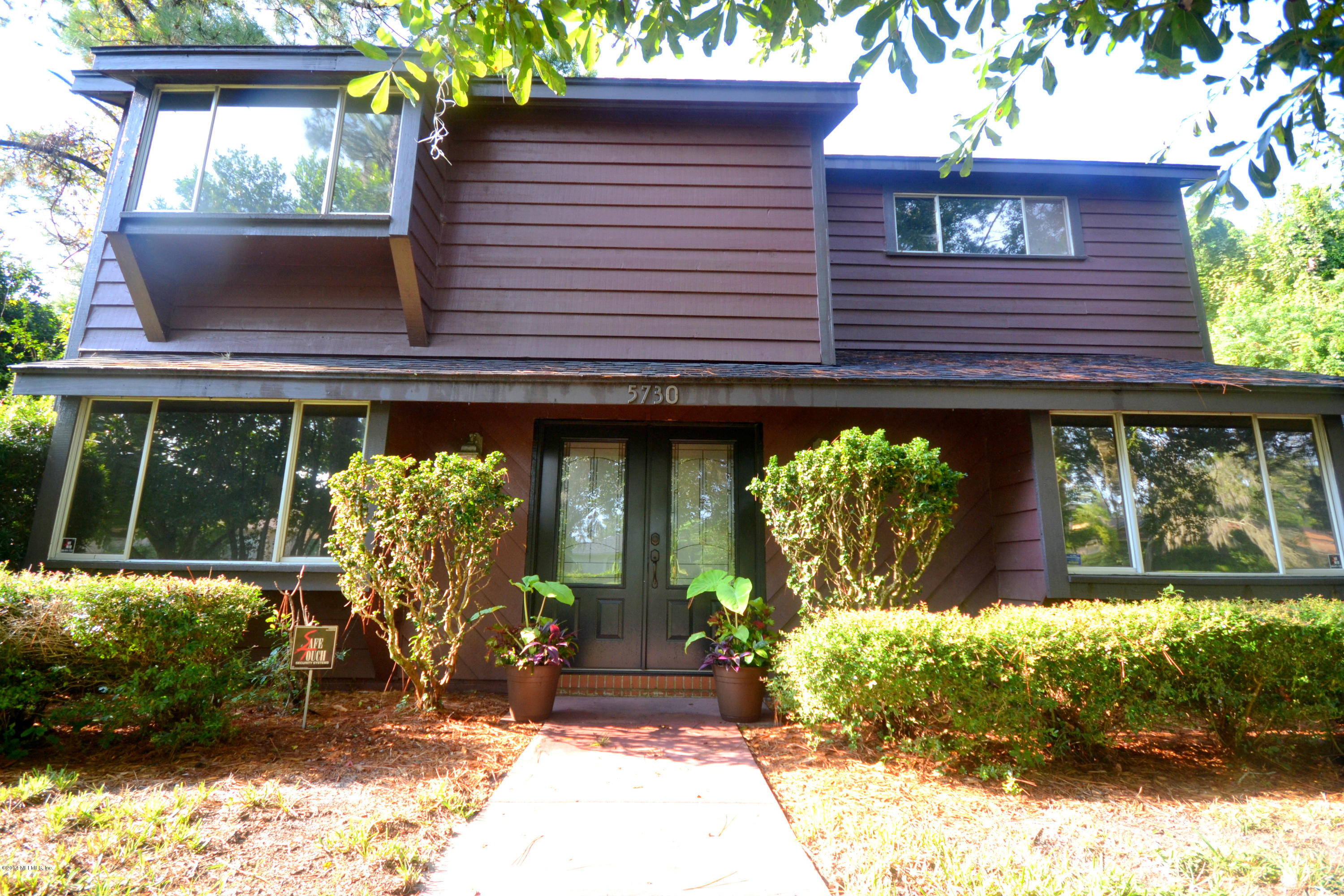 5730 Swamp Fox Road Jacksonville, FL 32210 - Photo 2 of 41 Front of Home