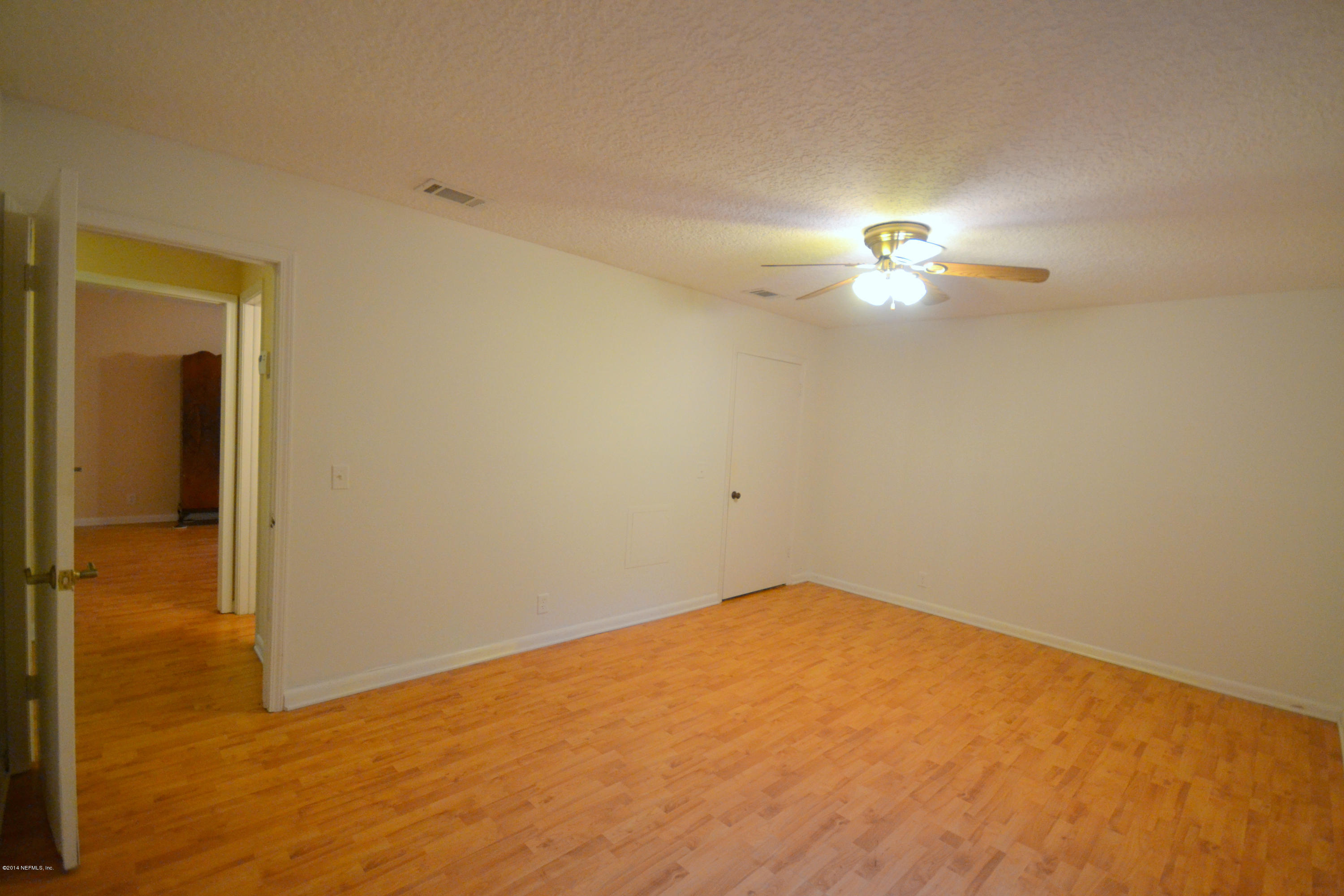 5730 Swamp Fox Road Jacksonville, FL 32210 - Photo 23 of 41 Upstairs Bedroom 1 with Large Closet
