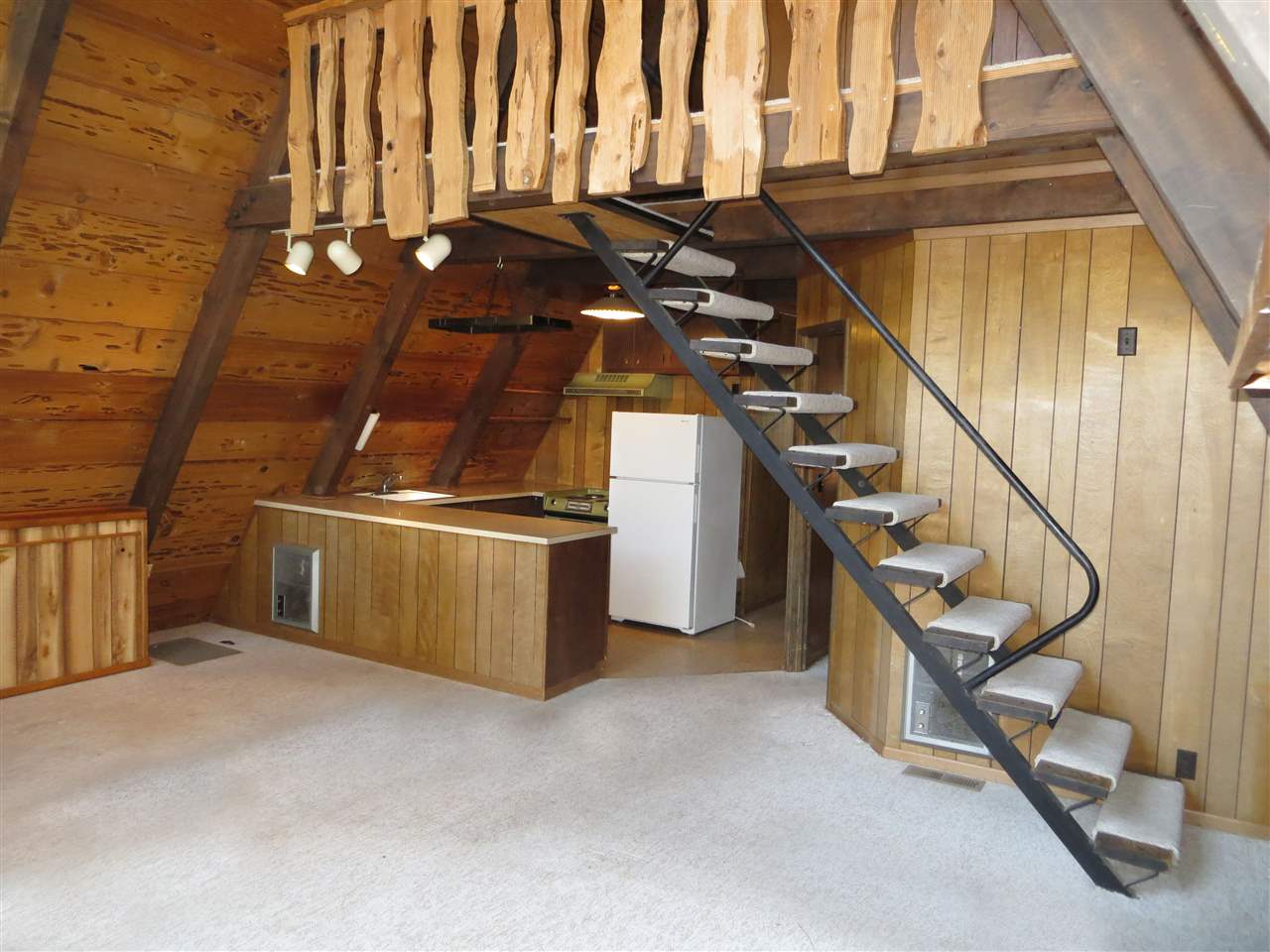 2648 Rustic Lane Homewood, CA 96141 - Photo 6 of 14 a view of an empty room with stairs