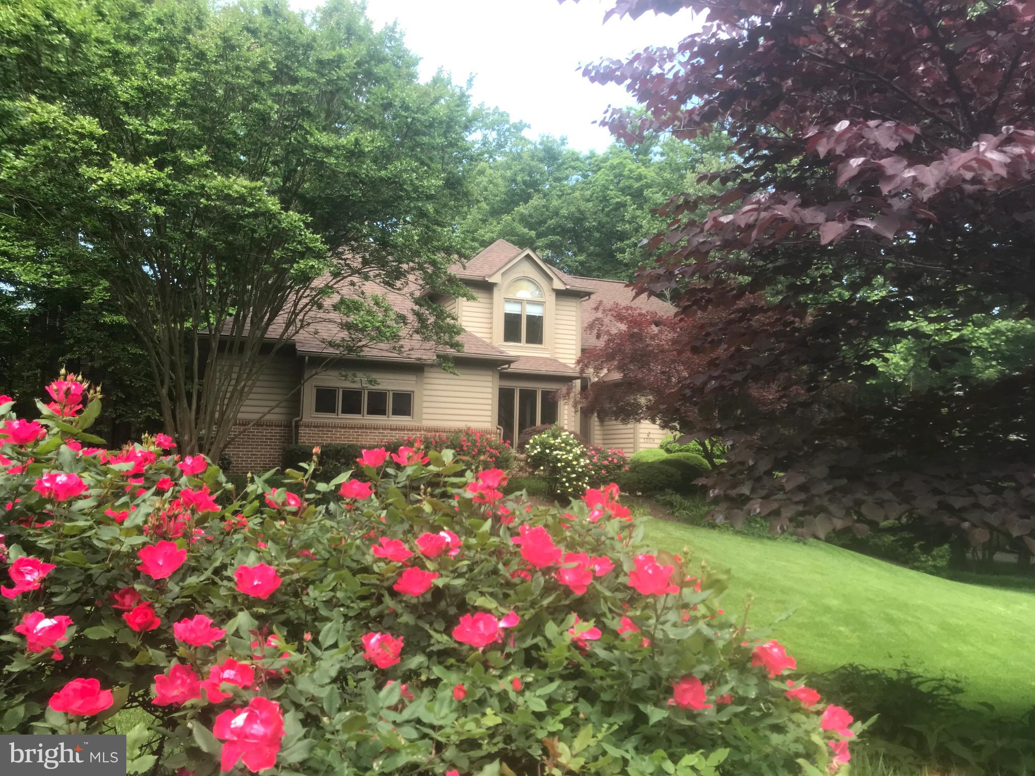 1308 Sawbridge Way Reston, VA 20194 - Photo 1 of 61 In full bloom, lush landscaping..