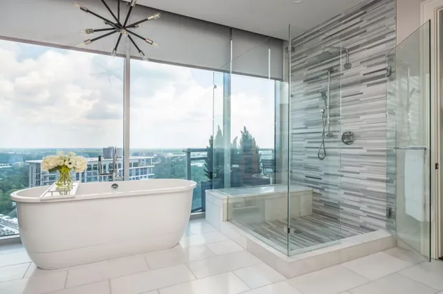 a large kitchen with a table and chairs