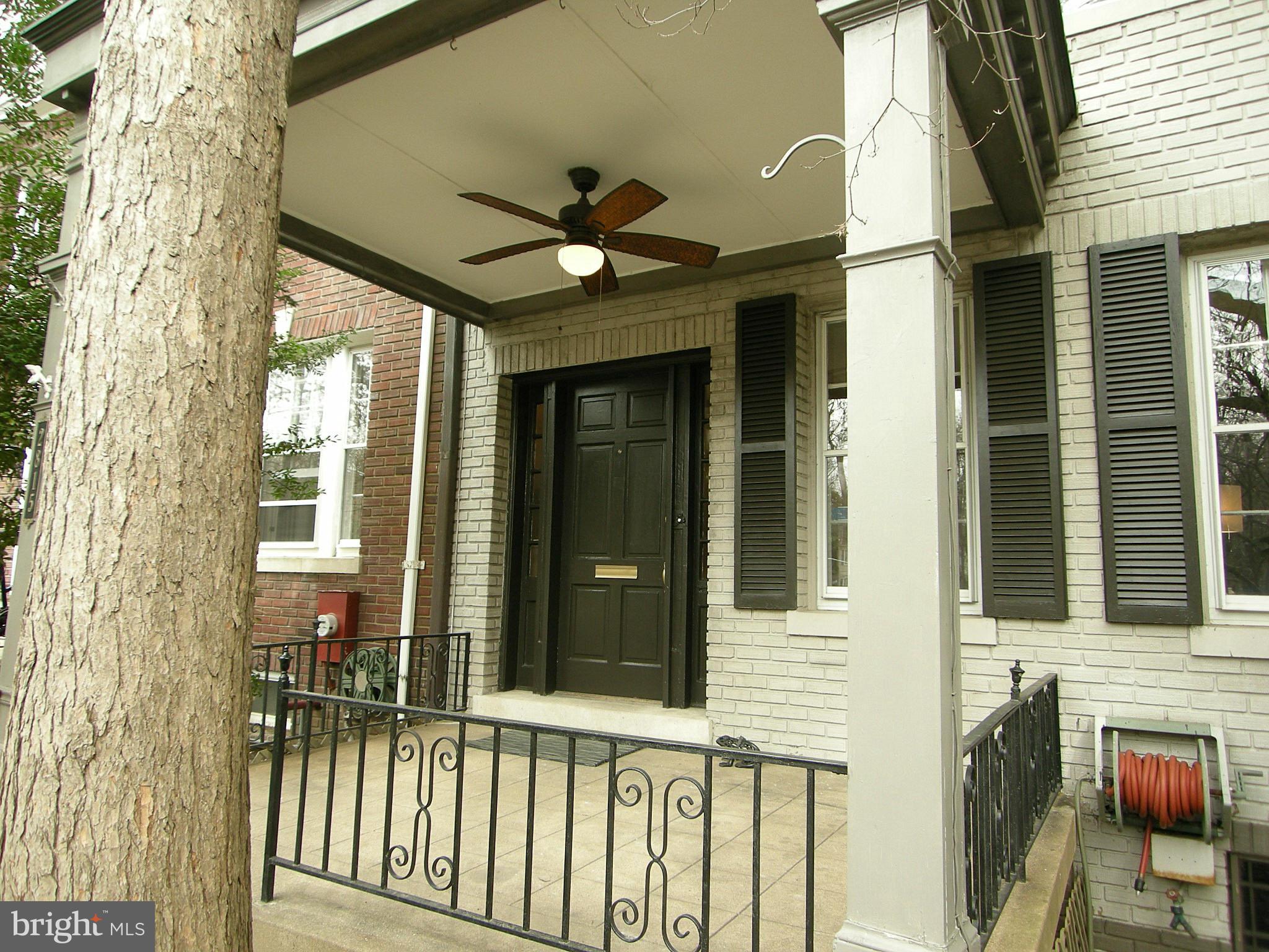 2815 Woodley Road Northwest Washington, DC 20008 - Photo 2 of 25 a view of a house with a porch