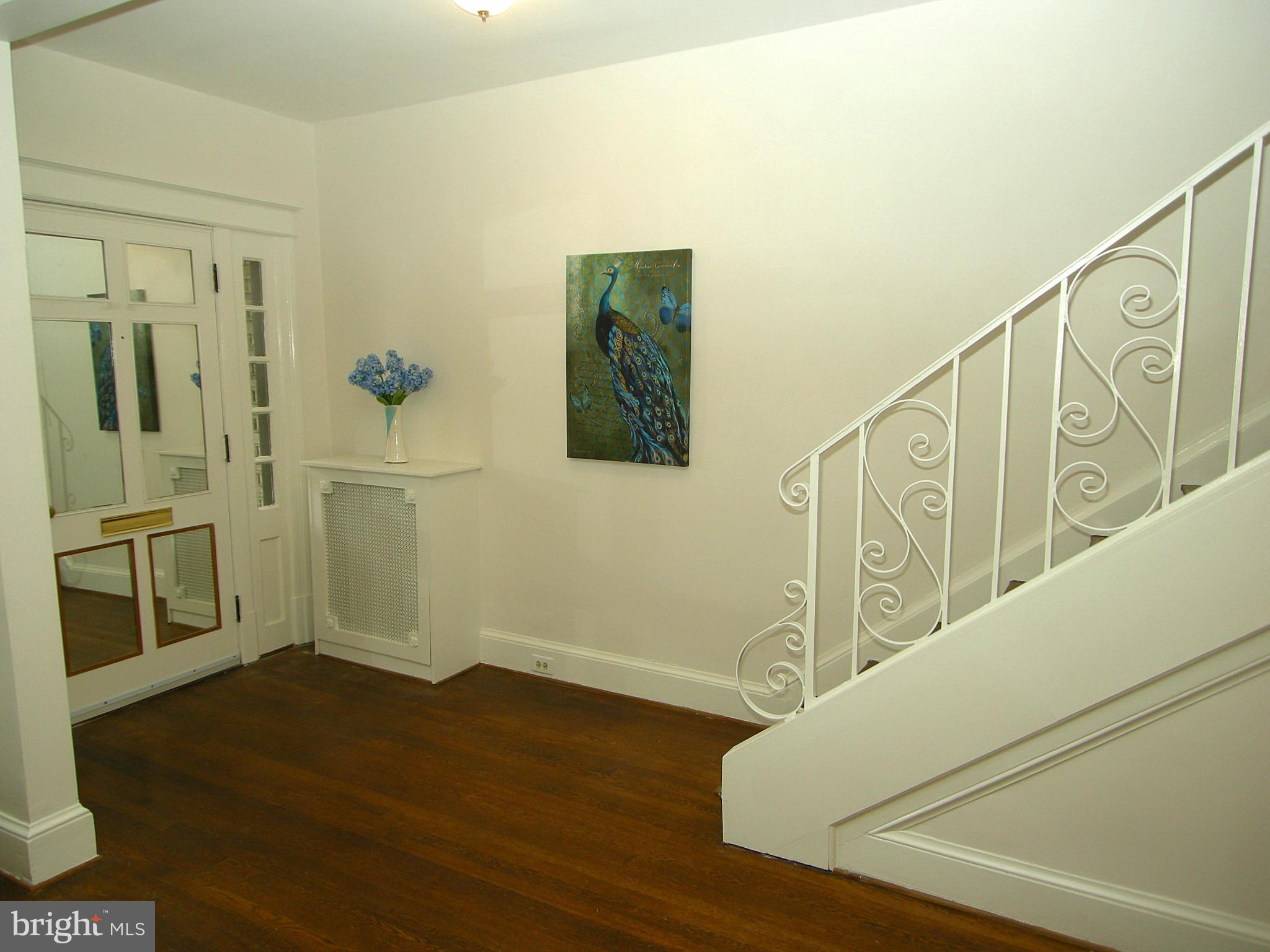 2815 Woodley Road Northwest Washington, DC 20008 - Photo 3 of 25 a view of an entryway with wooden floor