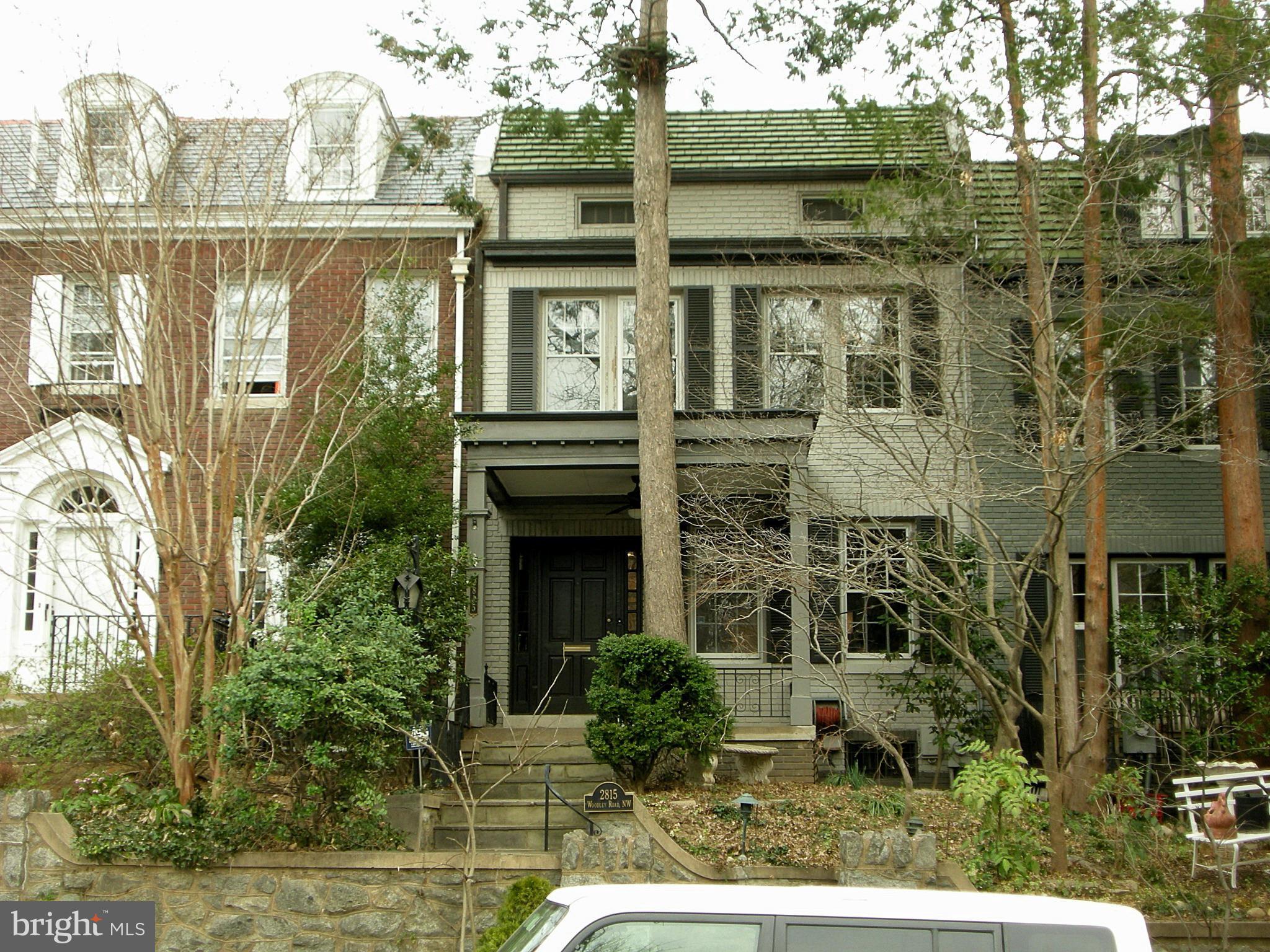 2815 Woodley Road Northwest Washington, DC 20008 - Photo 24 of 25 front view of a house with a yard