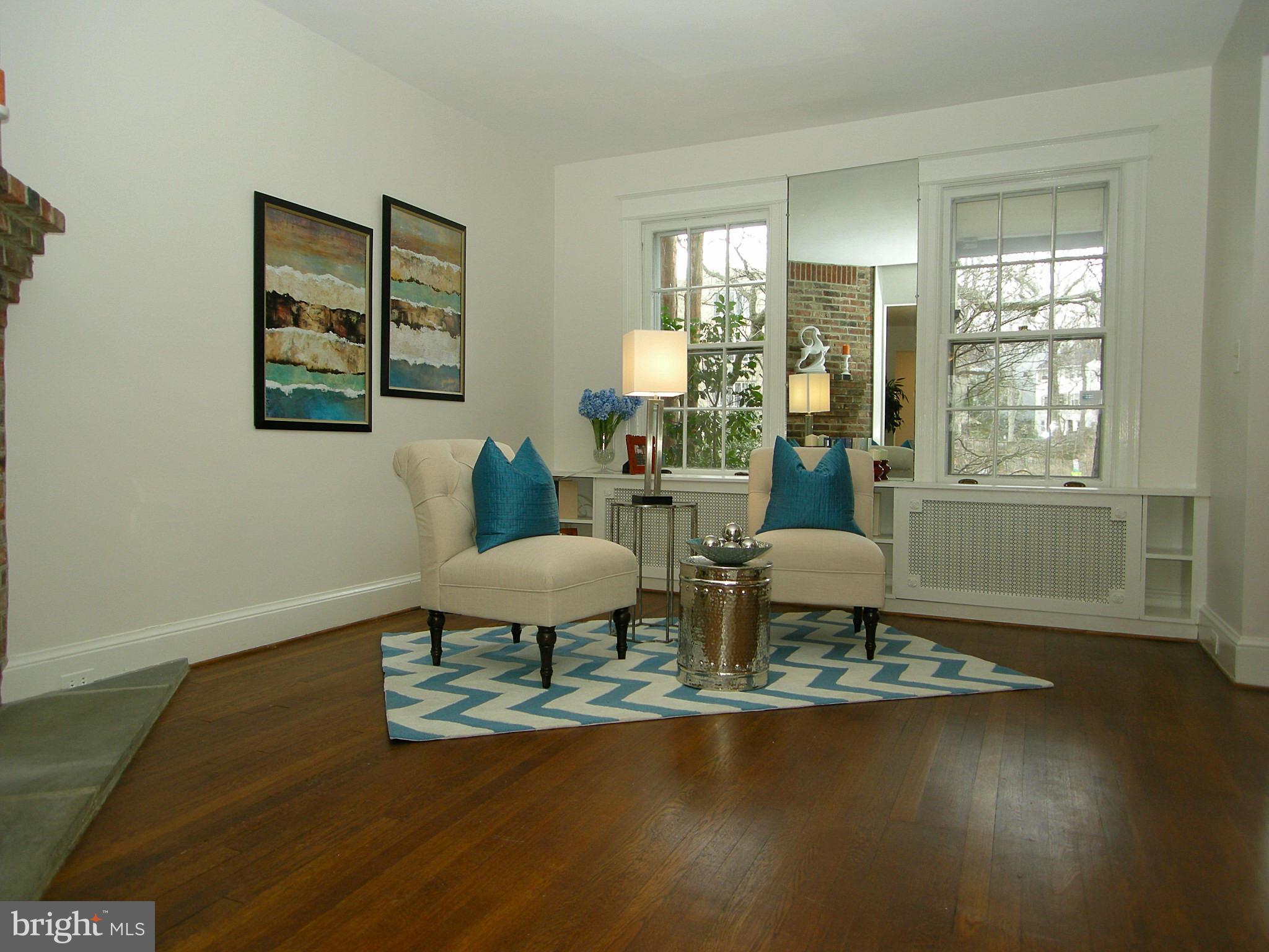 2815 Woodley Road Northwest Washington, DC 20008 - Photo 5 of 25 a living room with furniture and a window