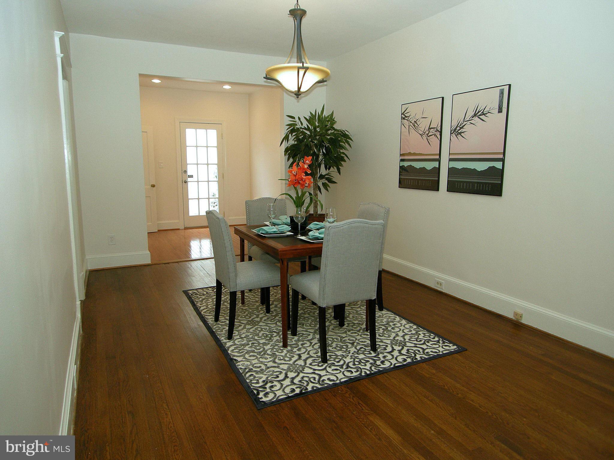 2815 Woodley Road Northwest Washington, DC 20008 - Photo 6 of 25 a dining room with furniture and window