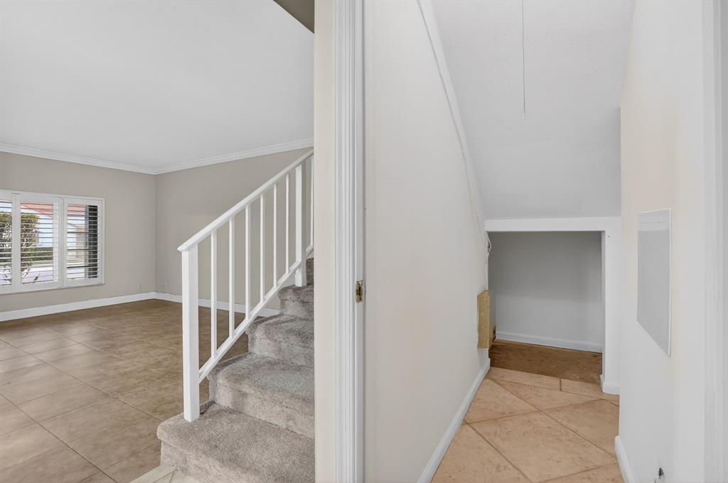 596 Southeast 20th Avenue, Unit 4 Deerfield Beach, FL 33441 - Photo 14 of 51 a view of an entryway with wooden floor