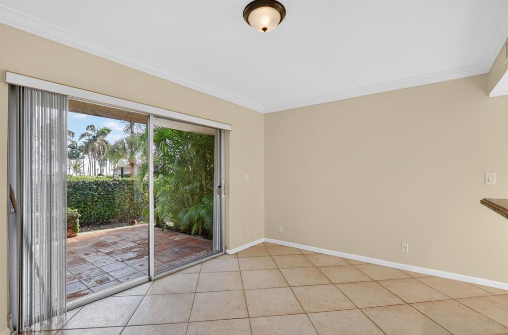 596 Southeast 20th Avenue, Unit 4 Deerfield Beach, FL 33441 - Photo 18 of 51 a view of an empty room and window