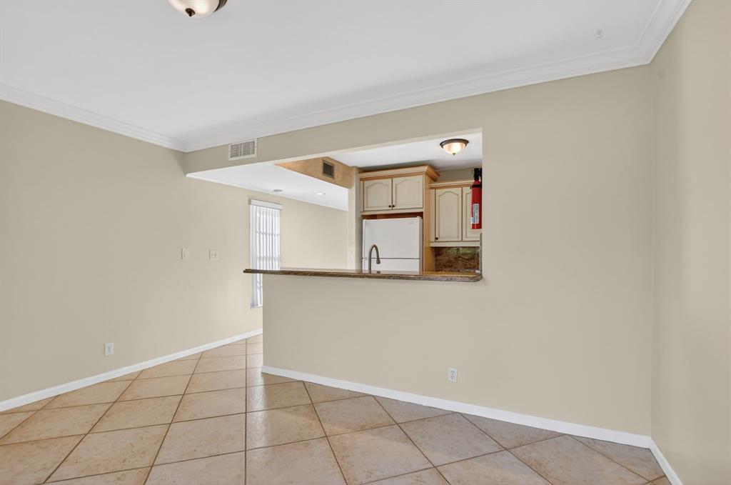 596 Southeast 20th Avenue, Unit 4 Deerfield Beach, FL 33441 - Photo 19 of 51 a view of an empty room
