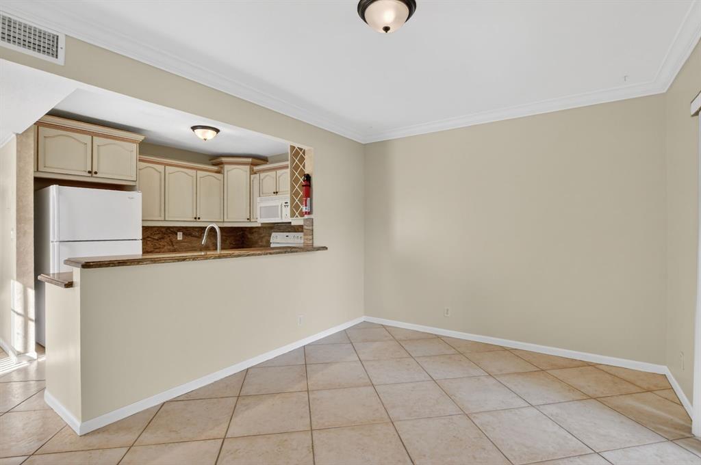 596 Southeast 20th Avenue, Unit 4 Deerfield Beach, FL 33441 - Photo 20 of 51 a view of a kitchen with a sink