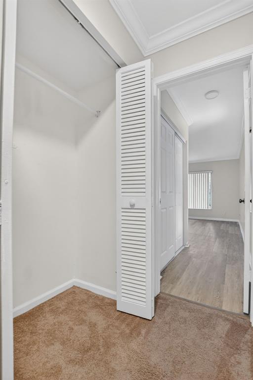 596 Southeast 20th Avenue, Unit 4 Deerfield Beach, FL 33441 - Photo 28 of 51 an empty room with windows