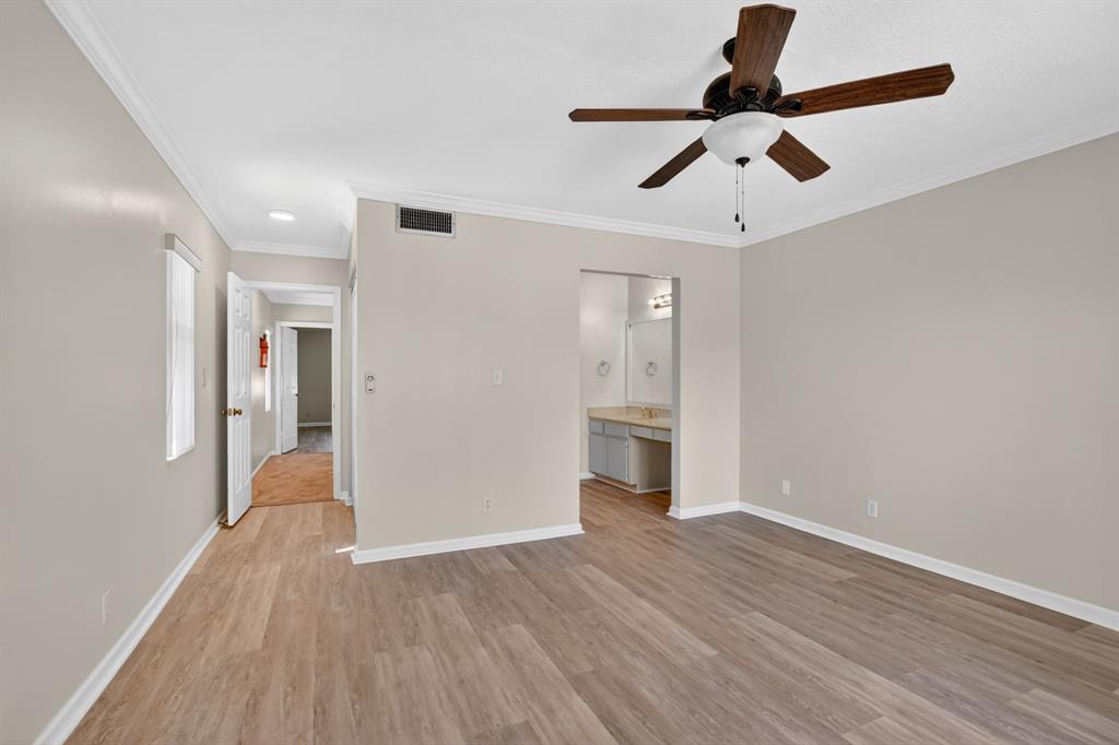 596 Southeast 20th Avenue, Unit 4 Deerfield Beach, FL 33441 - Photo 31 of 51 a view of empty room with wooden floor