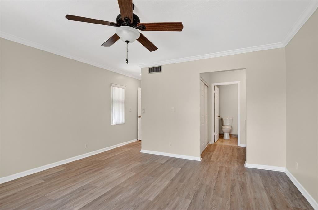 596 Southeast 20th Avenue, Unit 4 Deerfield Beach, FL 33441 - Photo 32 of 51 wooden floor in an empty room