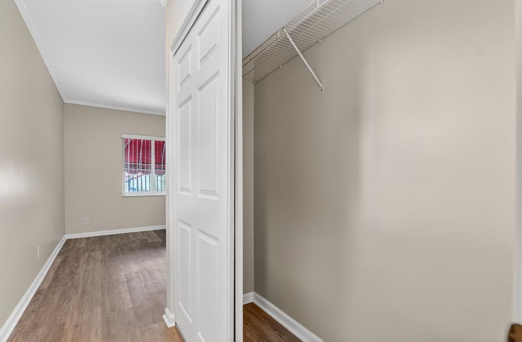 596 Southeast 20th Avenue, Unit 4 Deerfield Beach, FL 33441 - Photo 43 of 51 a view of hallway with wooden floor