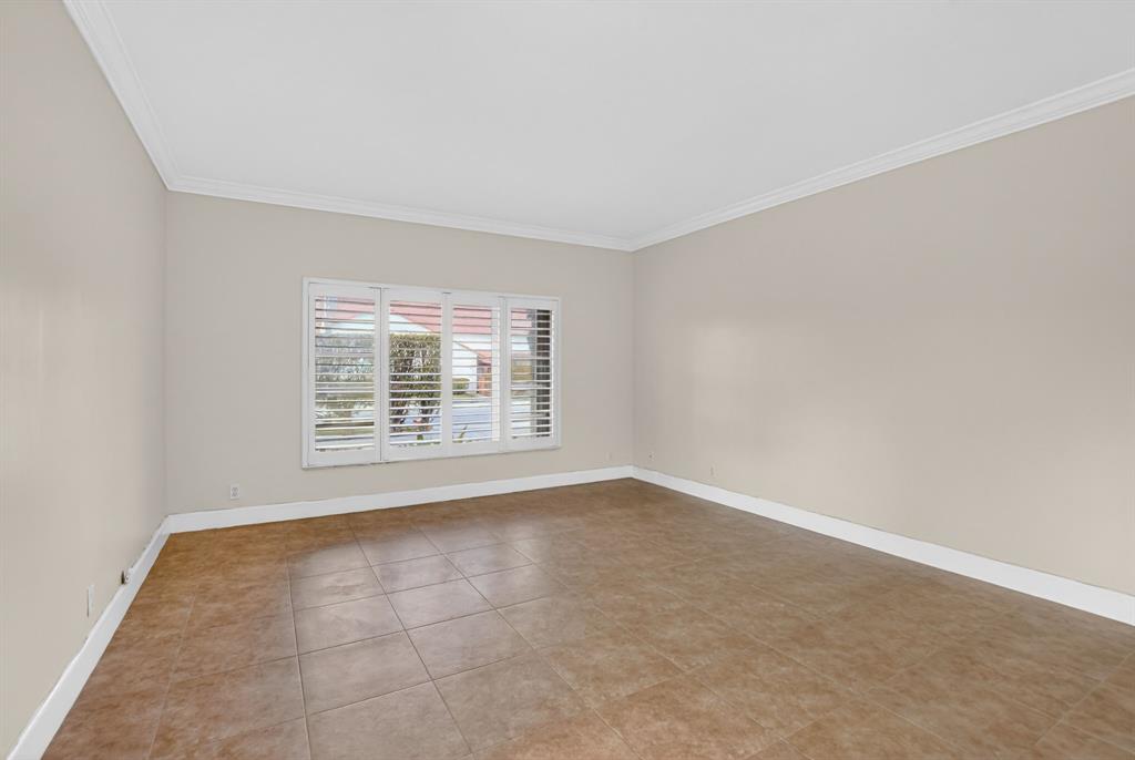 596 Southeast 20th Avenue, Unit 4 Deerfield Beach, FL 33441 - Photo 10 of 51 an empty room with a window