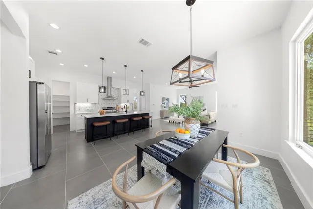 a livingroom with furniture and a window