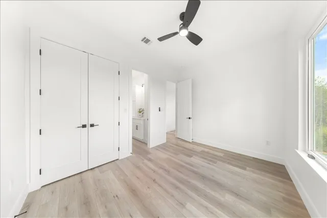 a view of an empty room and window