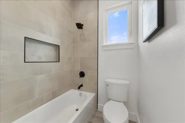 a bathroom with a sink a bathtub and a shower