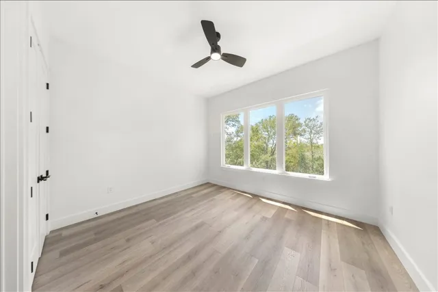 a bathroom with a toilet and a bathtub