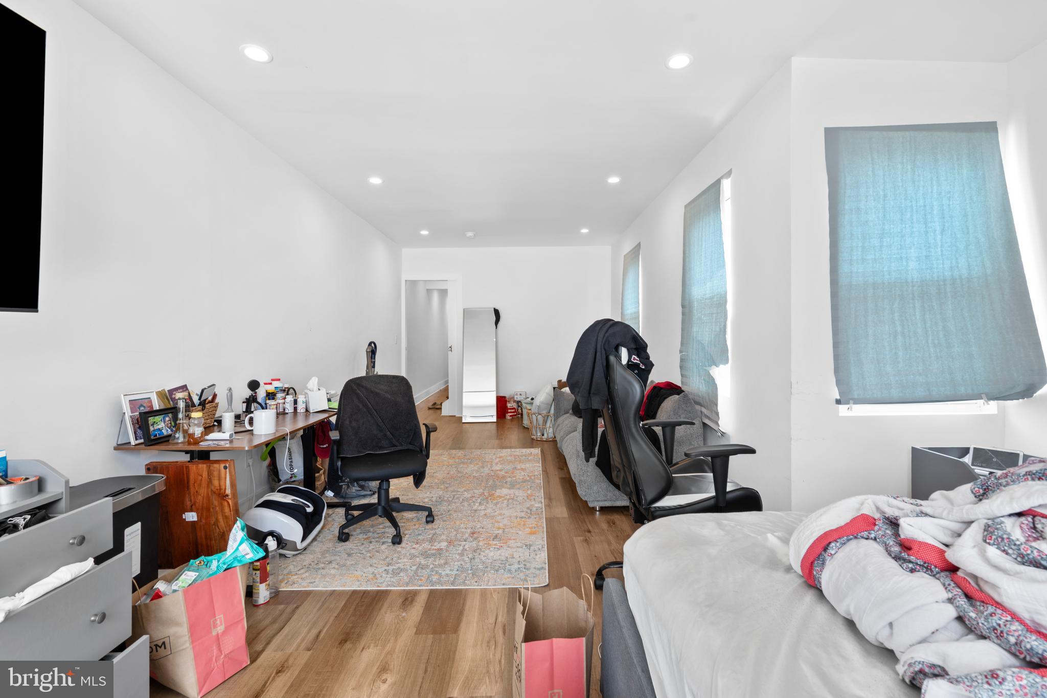 952 North 5th Street Philadelphia, PA 19123 - Photo 11 of 49 a view of a workspace with furniture and gym equipment