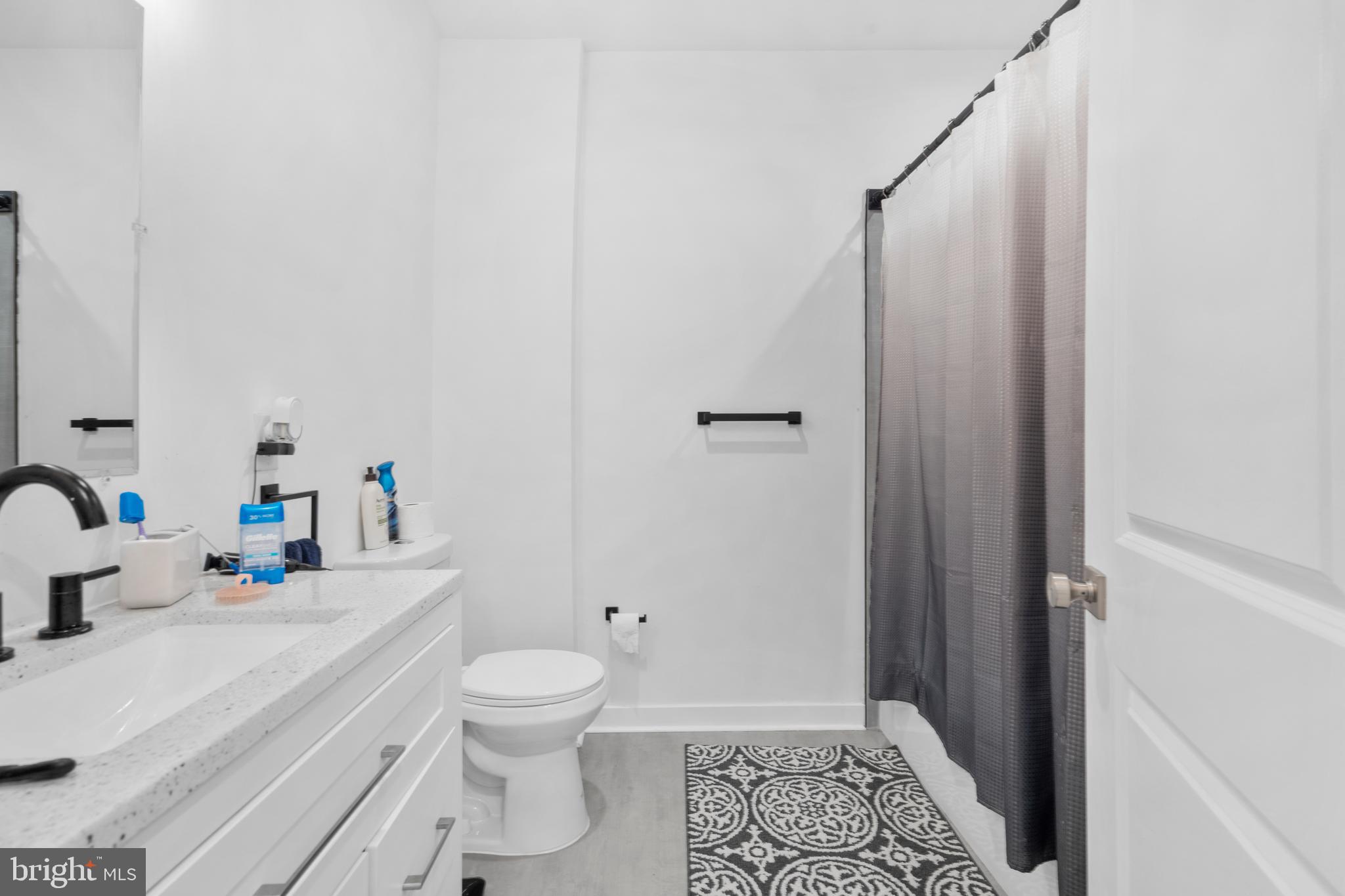 952 North 5th Street Philadelphia, PA 19123 - Photo 20 of 49 a bathroom with a sink toilet and shower