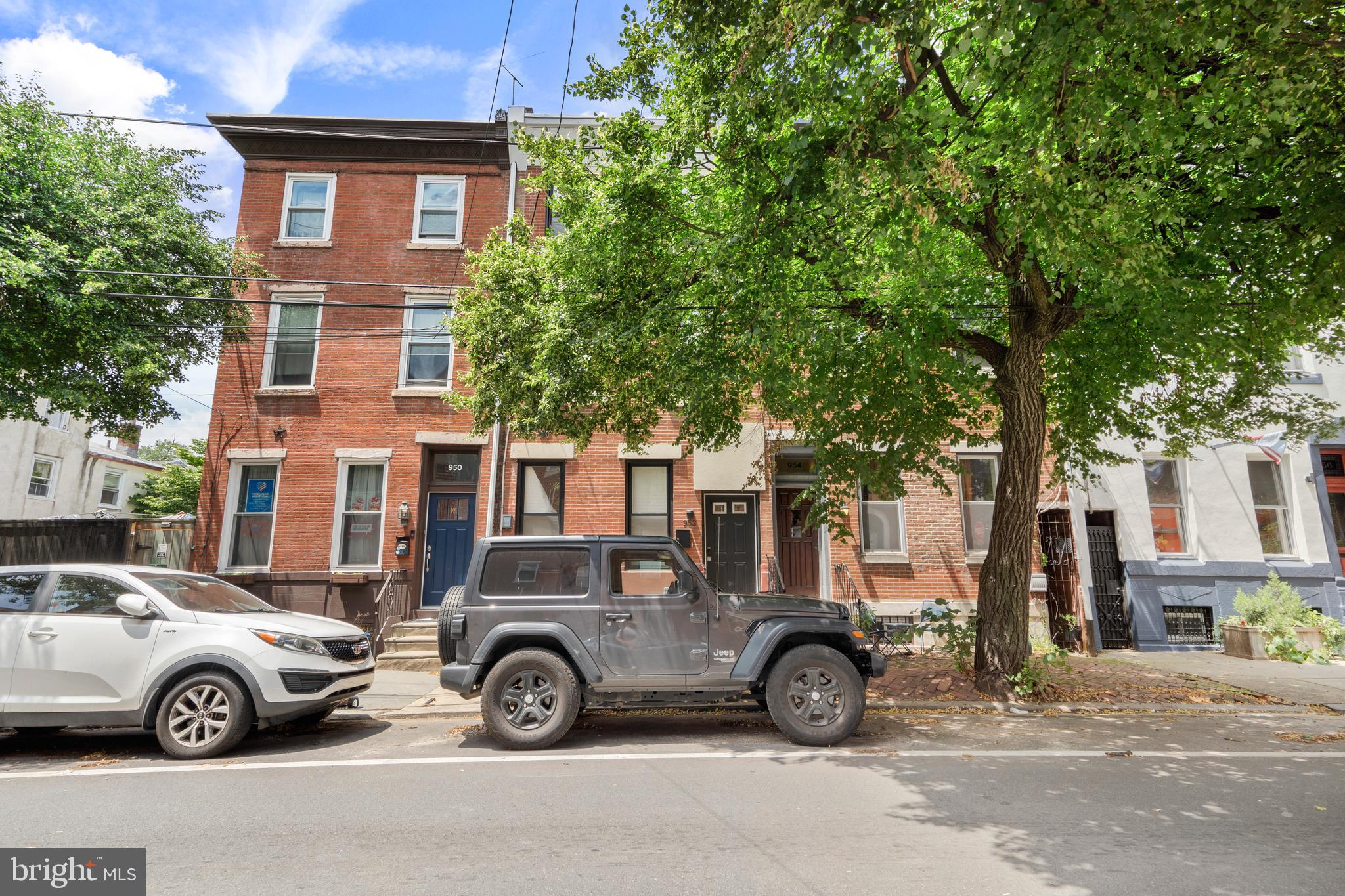 952 North 5th Street Philadelphia, PA 19123 - Photo 2 of 49 a car parked in front of a house