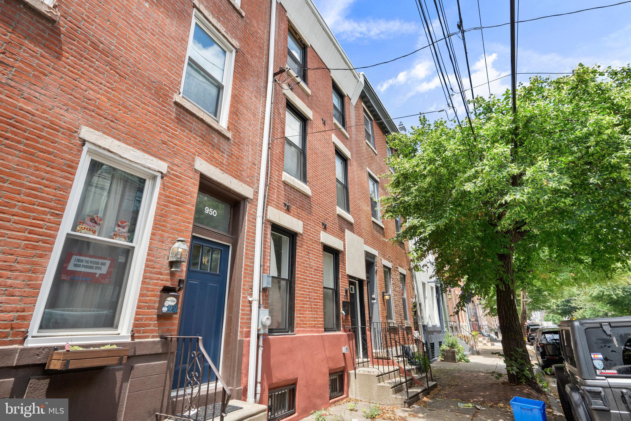 952 North 5th Street Philadelphia, PA 19123 - Photo 3 of 49 a view of a brick building next to a yard