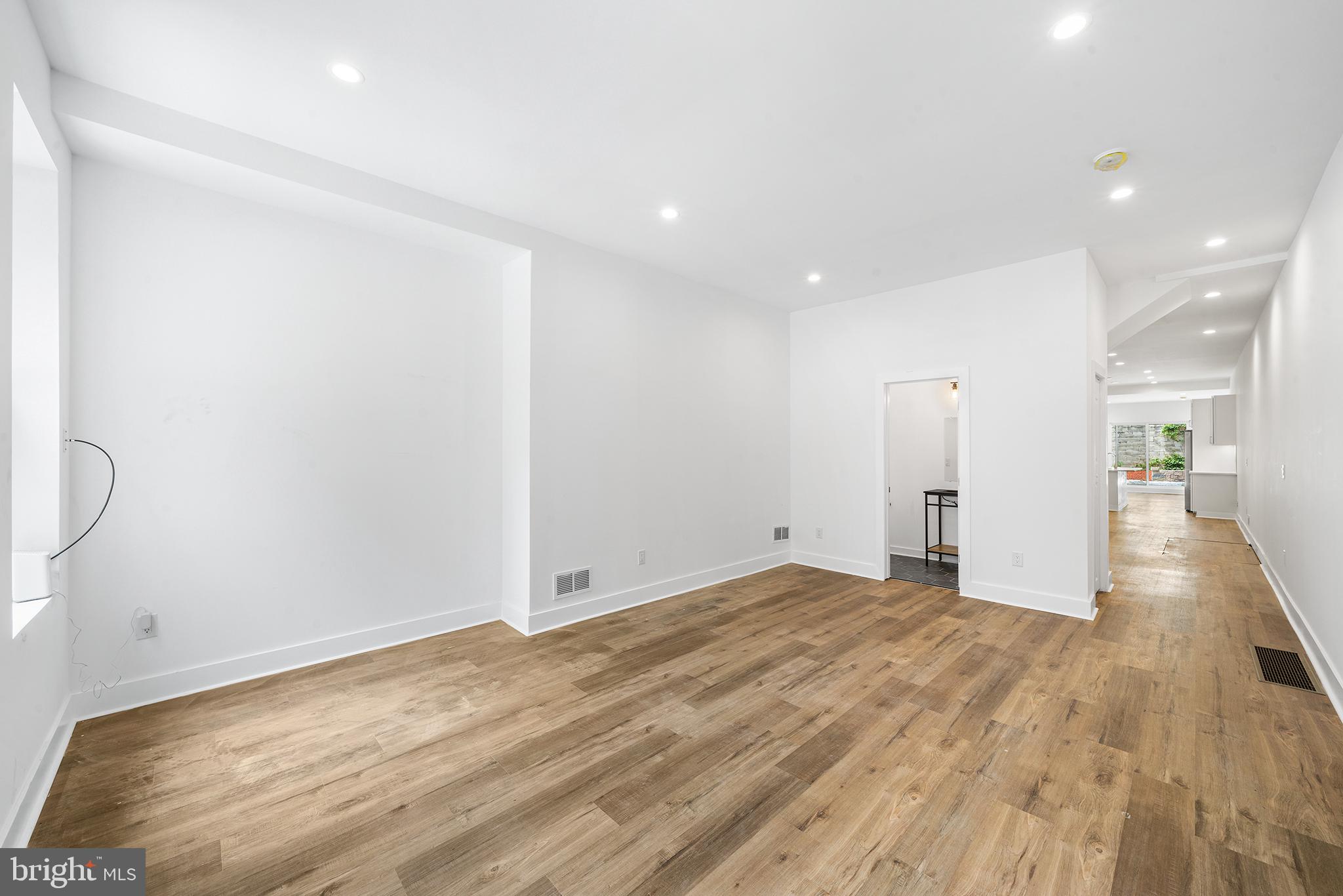 952 North 5th Street Philadelphia, PA 19123 - Photo 32 of 49 a view of an empty room with wooden floor