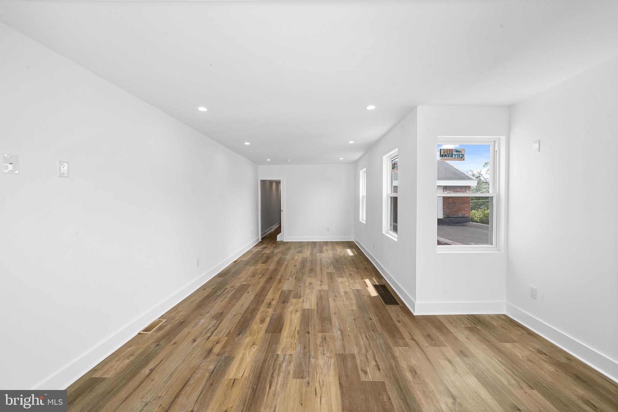 952 North 5th Street Philadelphia, PA 19123 - Photo 48 of 49 a view of empty room with wooden floor and fan