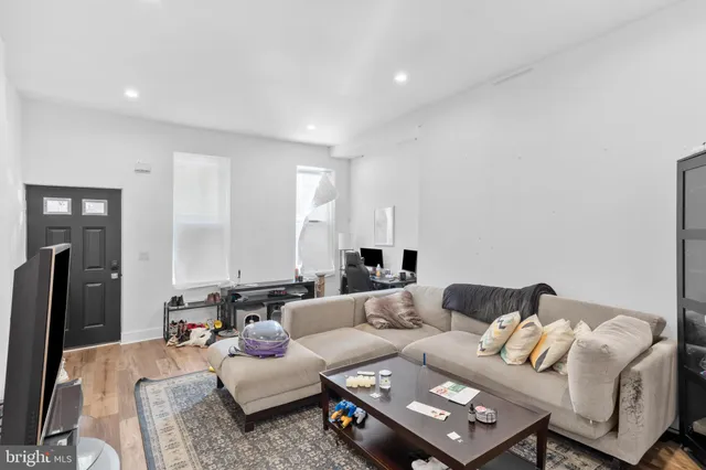 a living room with furniture and a couch