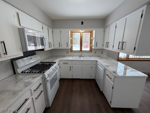 1933 Arndale Road Stow, OH 44224 - Photo 3 of 21 Kitchen with range, white cabinetry, dark wood-type flooring