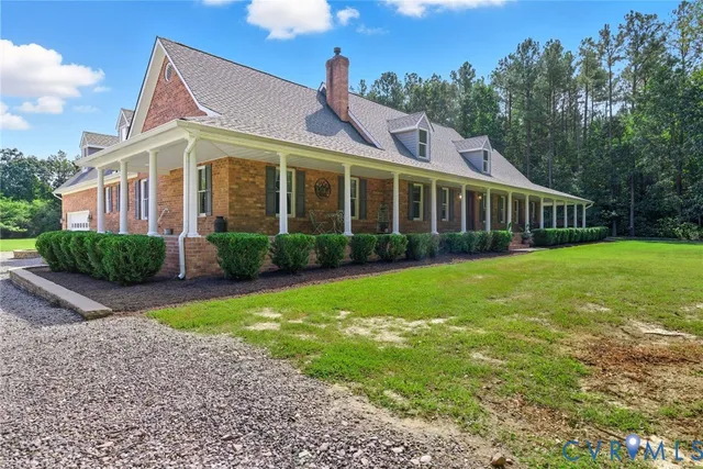 a view of a house with a garden