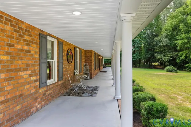 a view of a back yard of the house