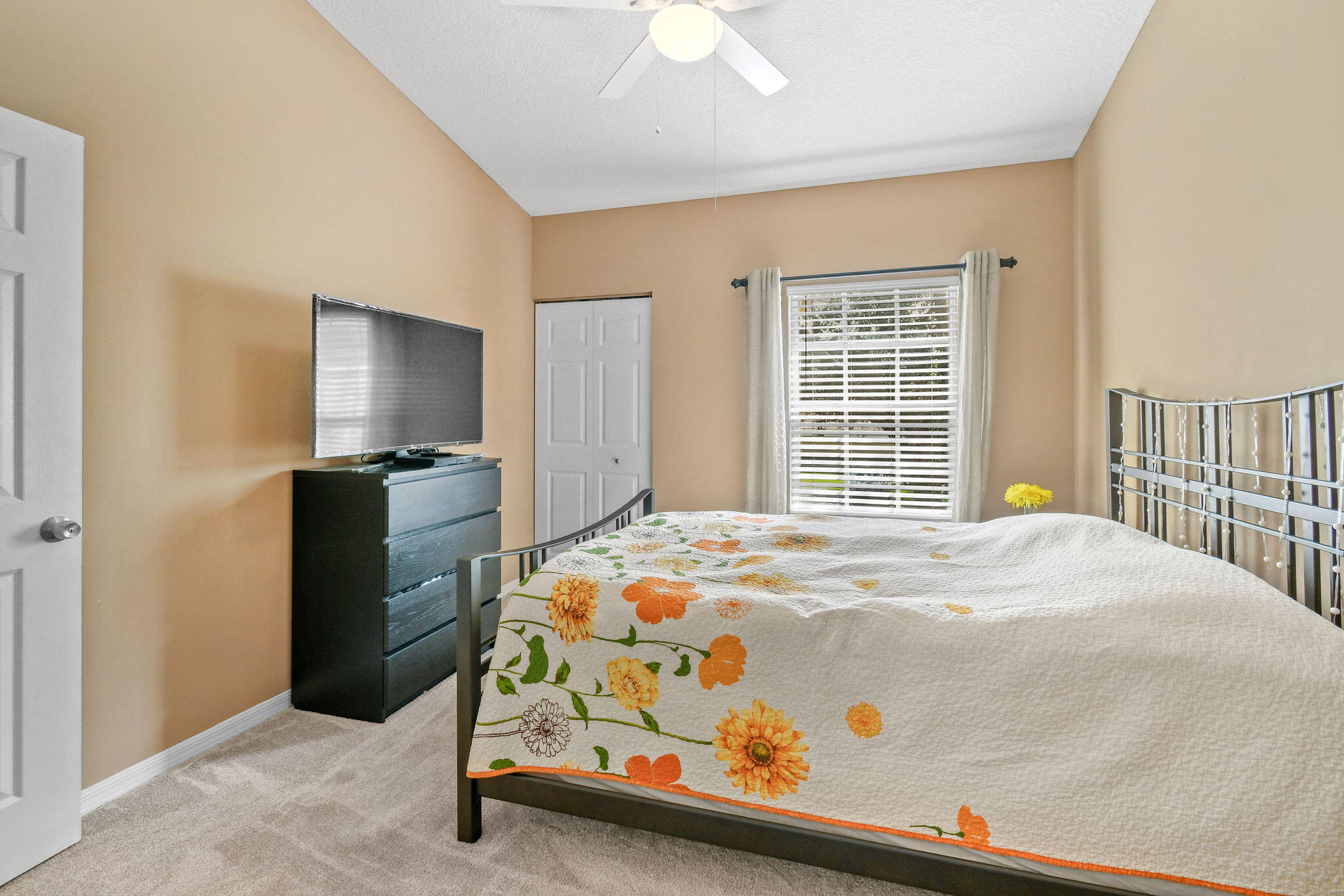 10354 Fox Trail Road South, Unit 1505 West Palm Beach, FL 33411 - Photo 60 of 76 a bedroom with a bed and a window