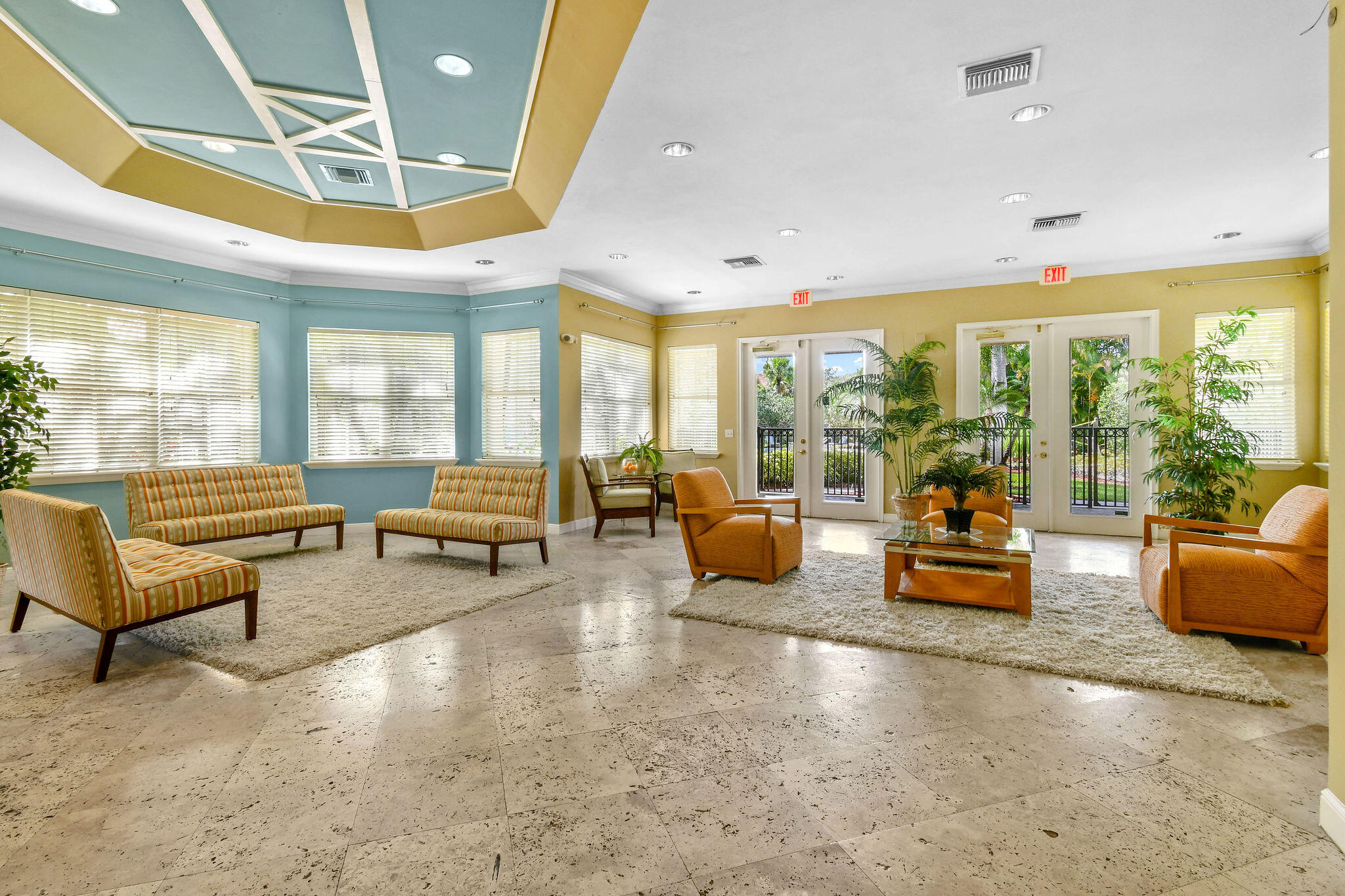 10354 Fox Trail Road South, Unit 1505 West Palm Beach, FL 33411 - Photo 67 of 76 a living room with furniture and a large window