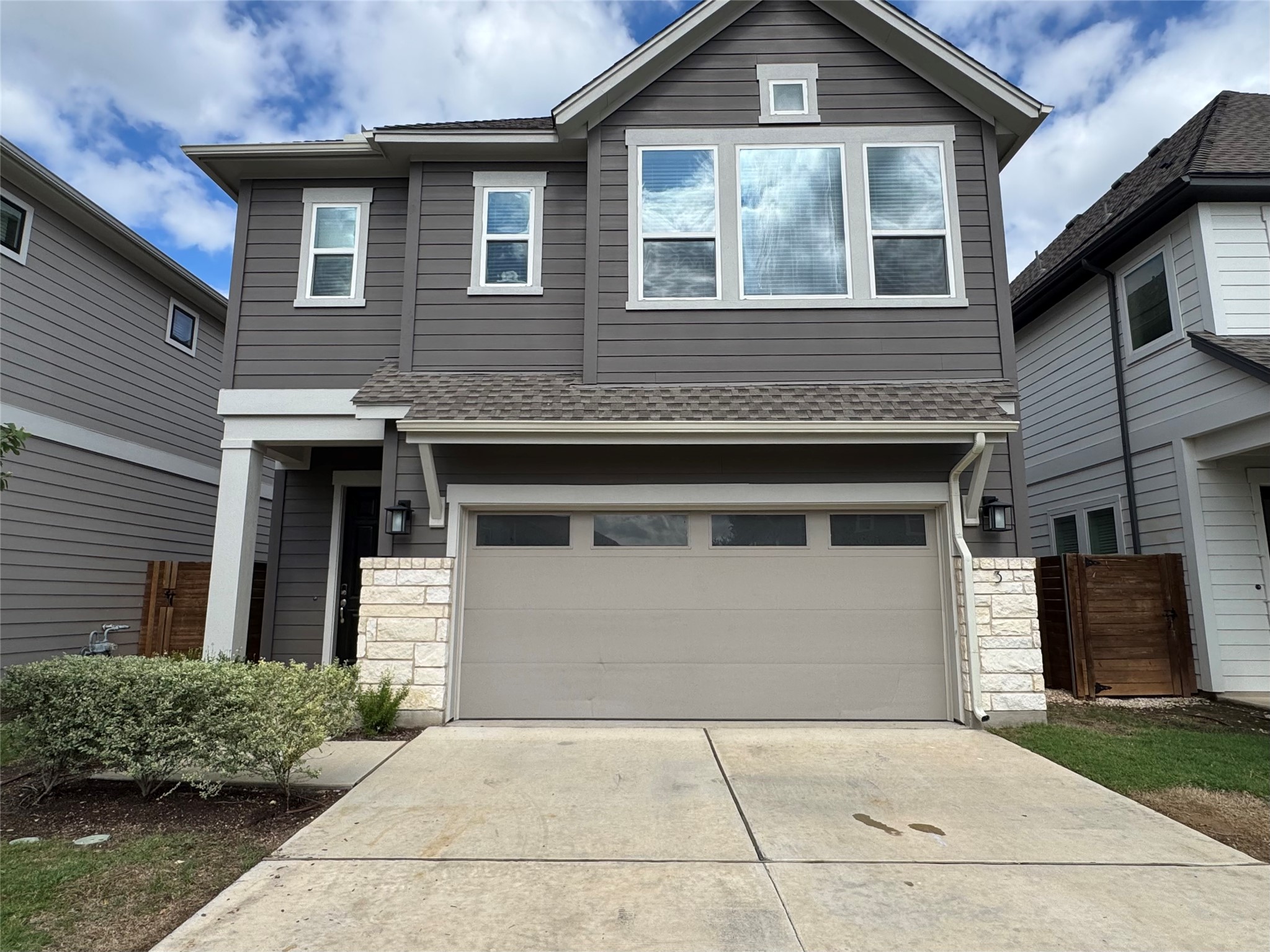 3000 Chisholm Trail Road, Unit 3 Round Rock, TX 78681 - Photo 1 of 28 a front view of a house with garden