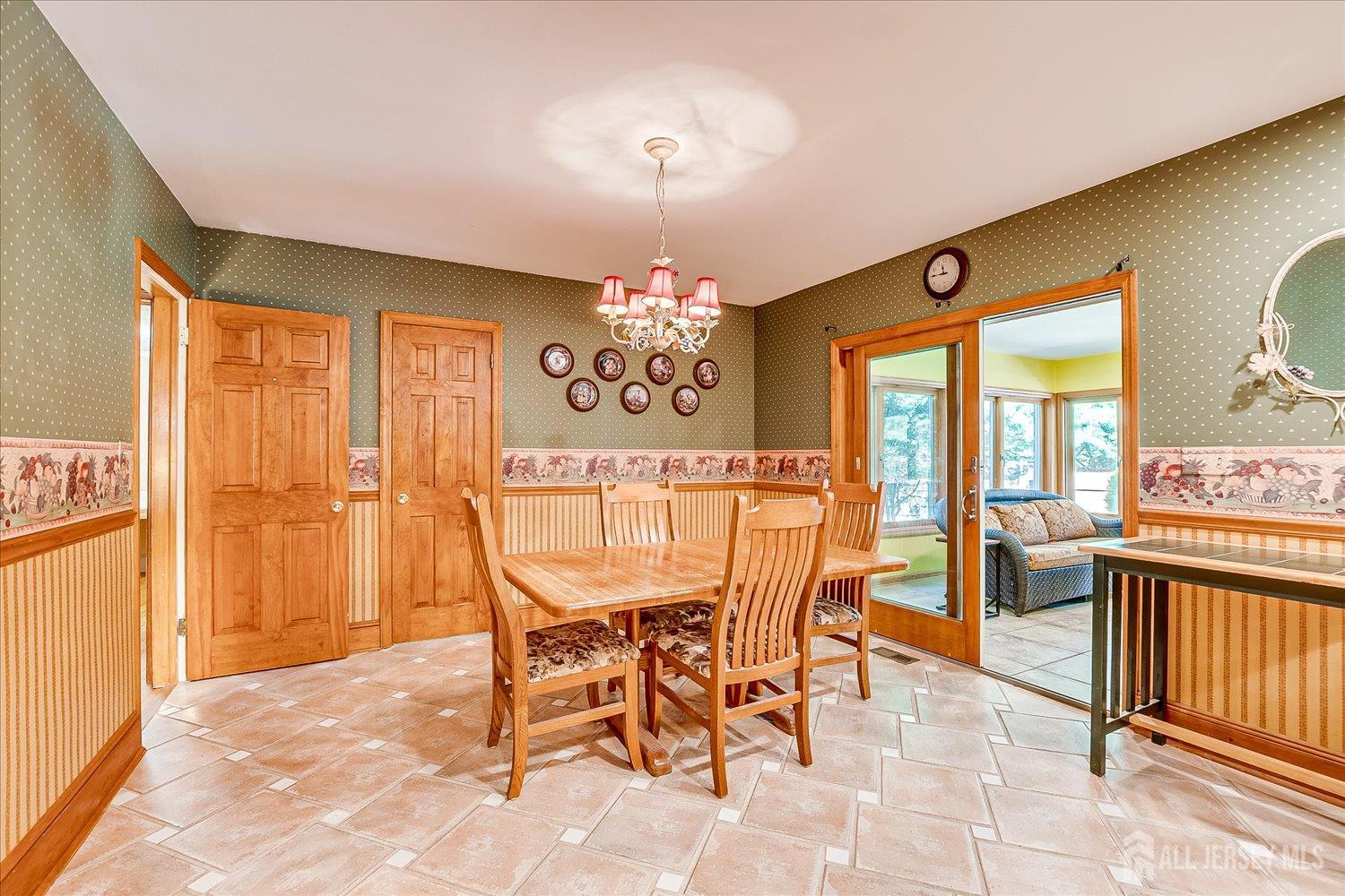 39 Rayle Court Metuchen, NJ 08840 - Photo 14 of 29 a view of a dining room with furniture window and outside view
